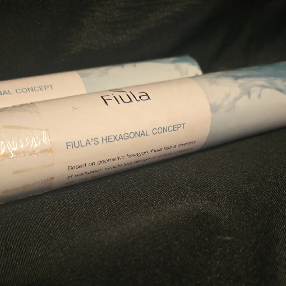 White and Blue Adhesive Paper Rolls